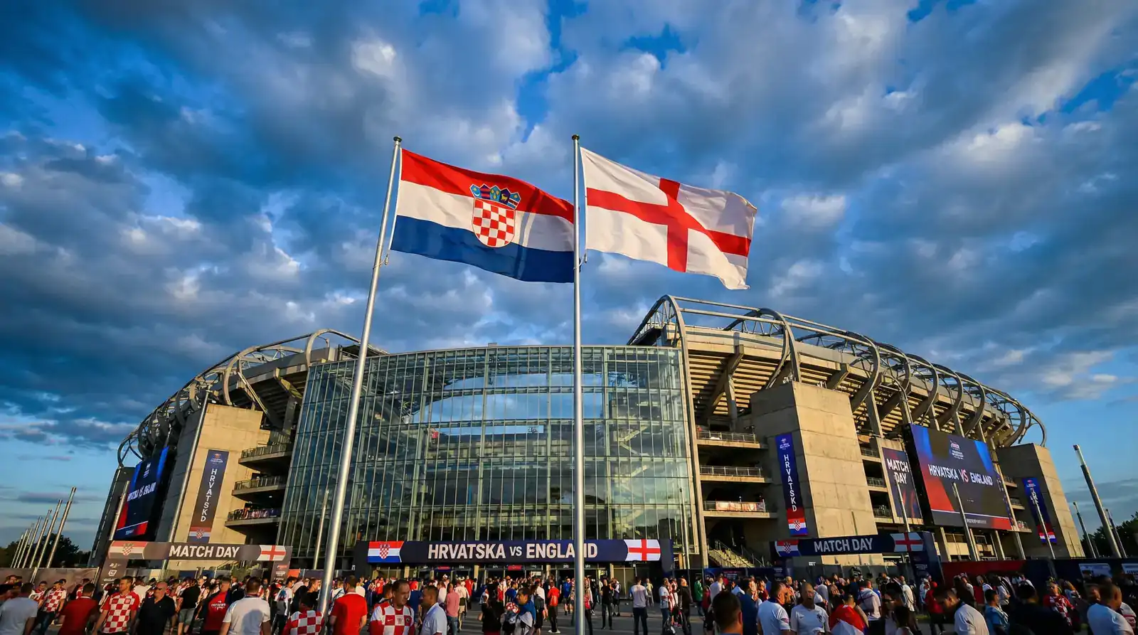 Zastave Hrvatske i Engleske vijore se na vjetru ispred velikog nogometnog stadiona prije velike utakmice
